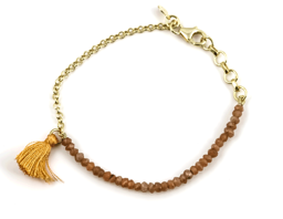 Vedere dettagli per "Tassel". Pietra di luna color pesca. Bracciale. Argento 925 placcato oro Immagine di "Tassel". Pietra di luna color pesca. Bracciale. Argento 925 placcato oro