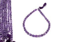 Zeige Details für Amethyst fac. Oval 7-8x10-12mm Strang Bild von Amethyst fac. Oval 7-8x10-12mm Strang