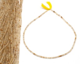 Vedere dettagli per Quarzo rutilato sfaccettato. Perline tonde da 3 mm Immagine di Quarzo rutilato sfaccettato. Perline tonde da 3 mm