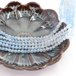 Zeige Details für Aquamarin fac. Kugeln  4mm Strang Standard Bild von Aquamarin fac. Kugeln  4mm Strang Standard