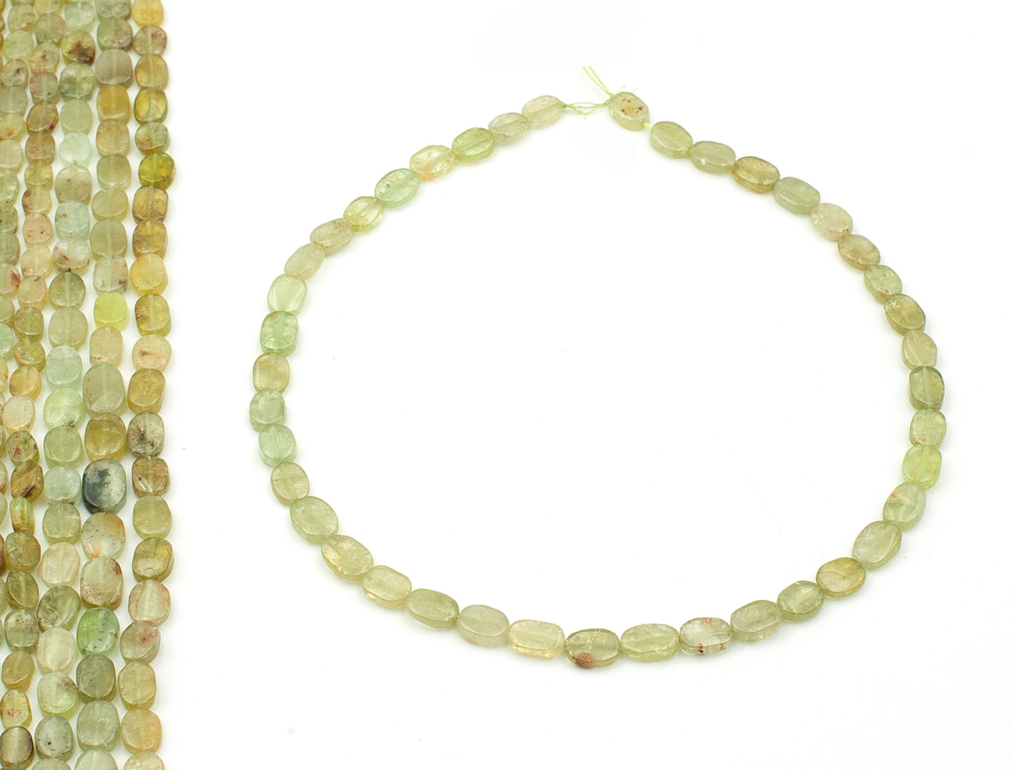 Bild von Peridot Oval flach Strang