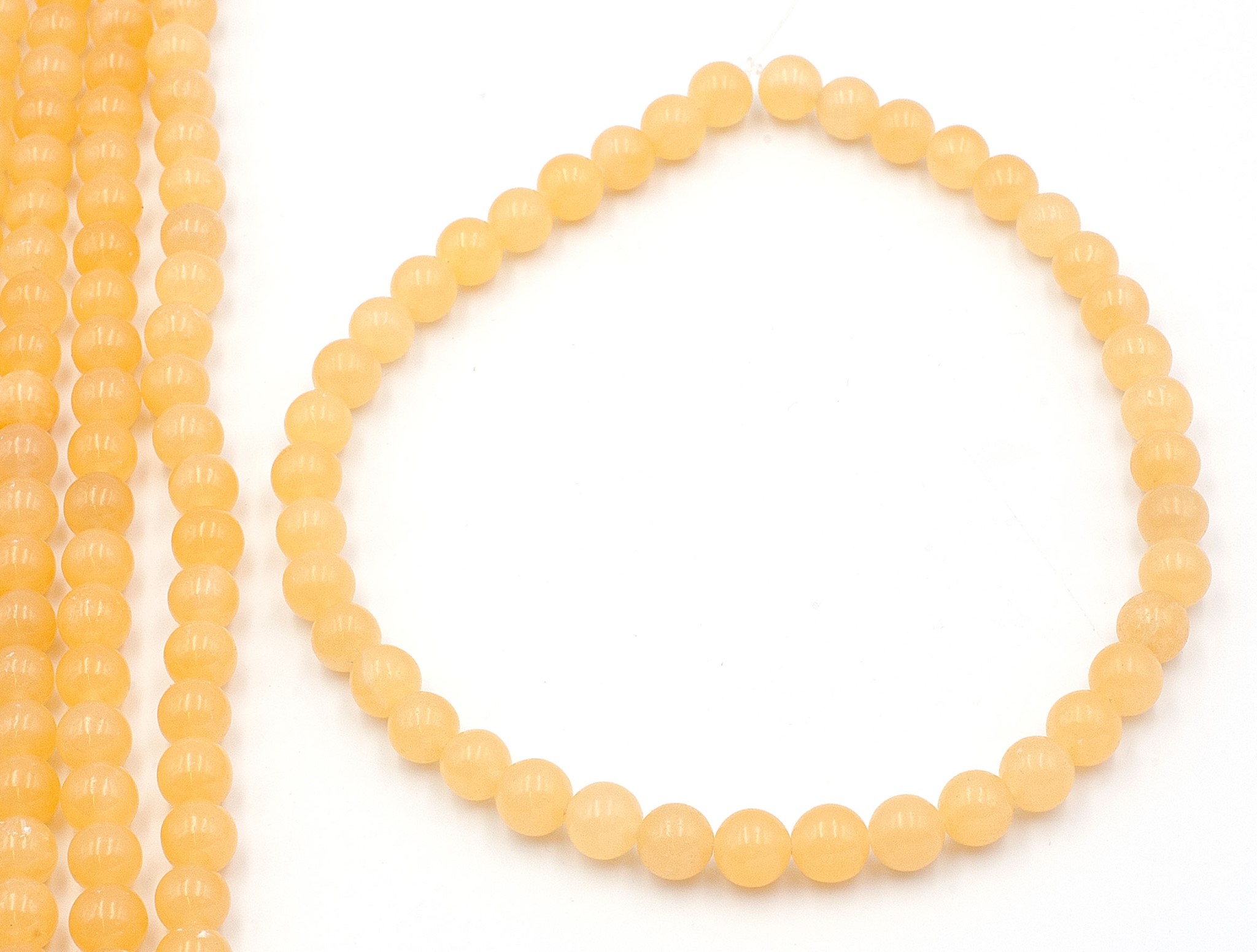 Bild von Oranger Calcit Kugeln 10mm Strang 