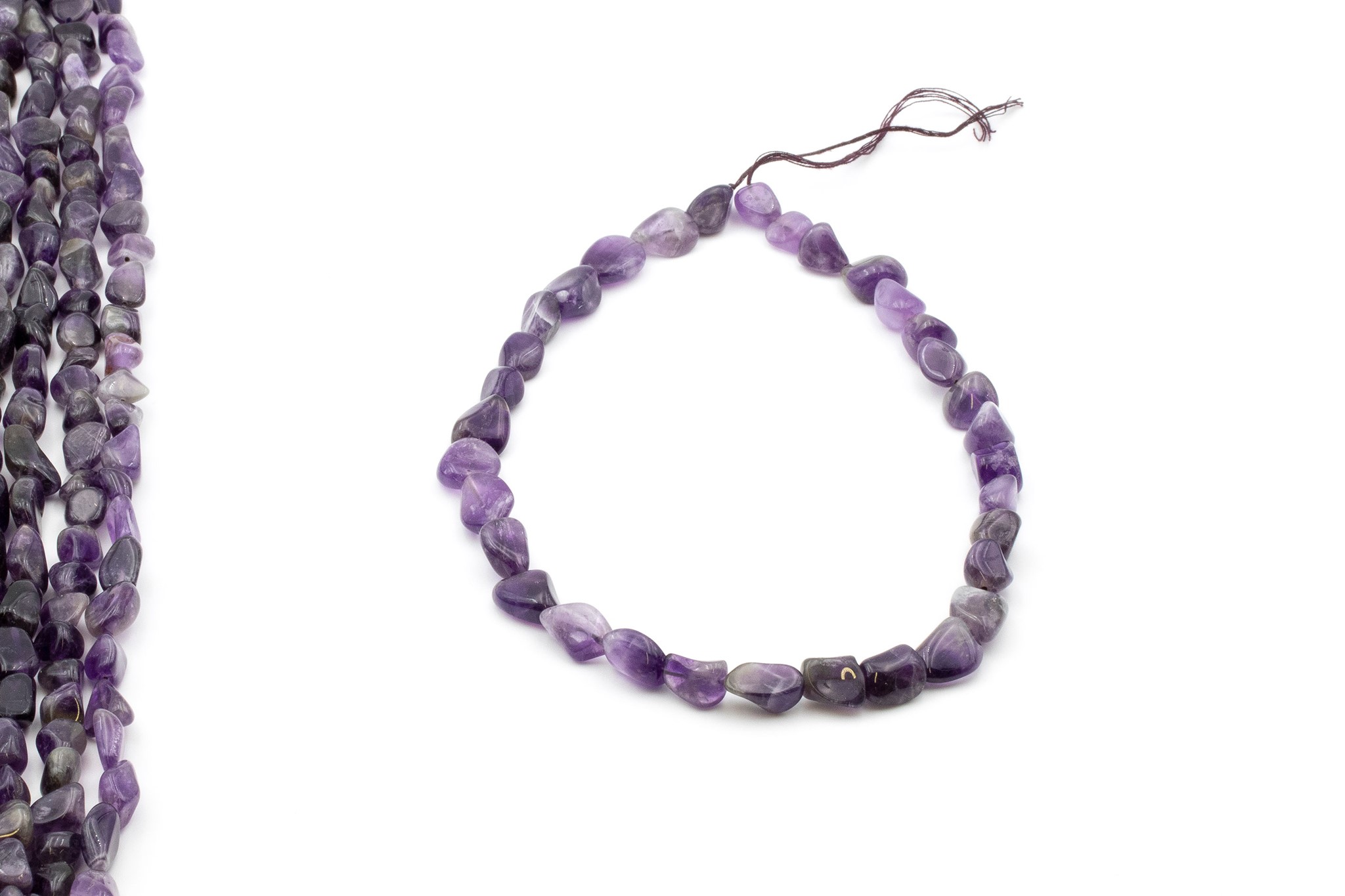 Immagine di Amethyst Trommelsteine 11-13mm Strang