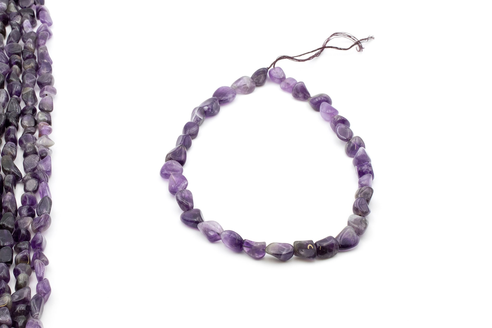 Bild von Amethyst Trommelsteine 11-13mm Strang