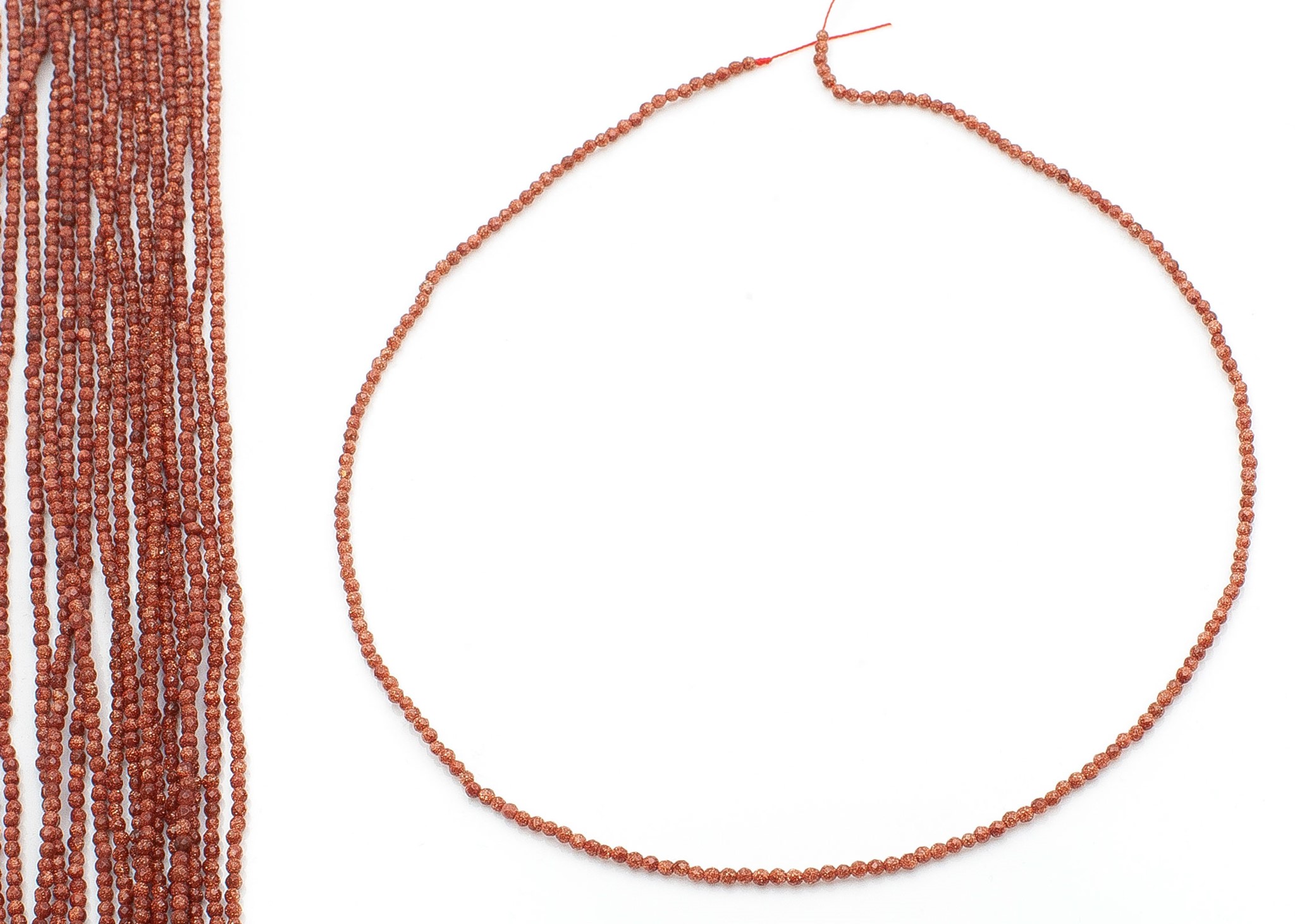 Goldfluss rot facettierte Kugeln  2mm Strang