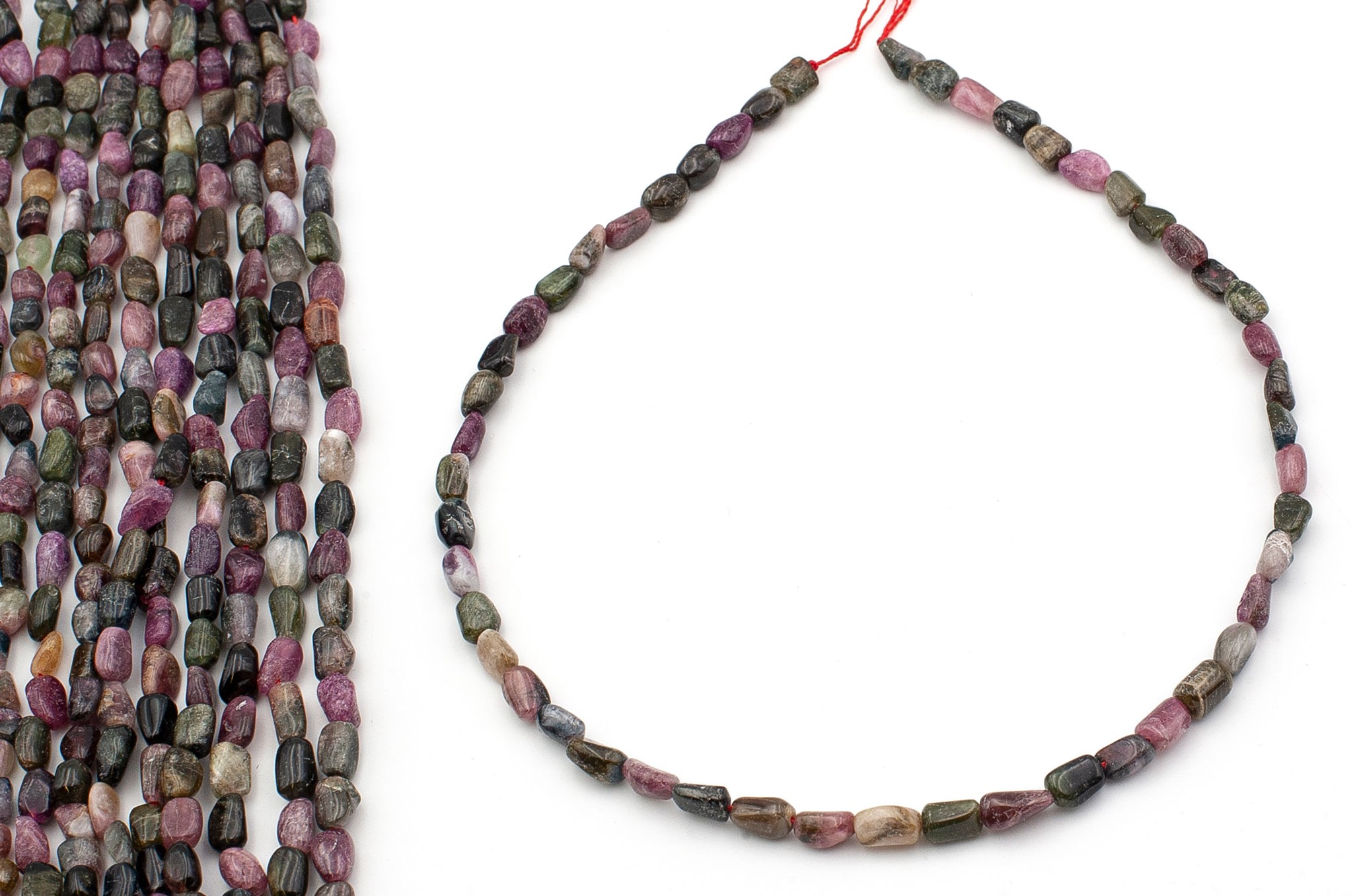 Bild von Turmalin farbig Trommel 7-10x10-15mm Strang