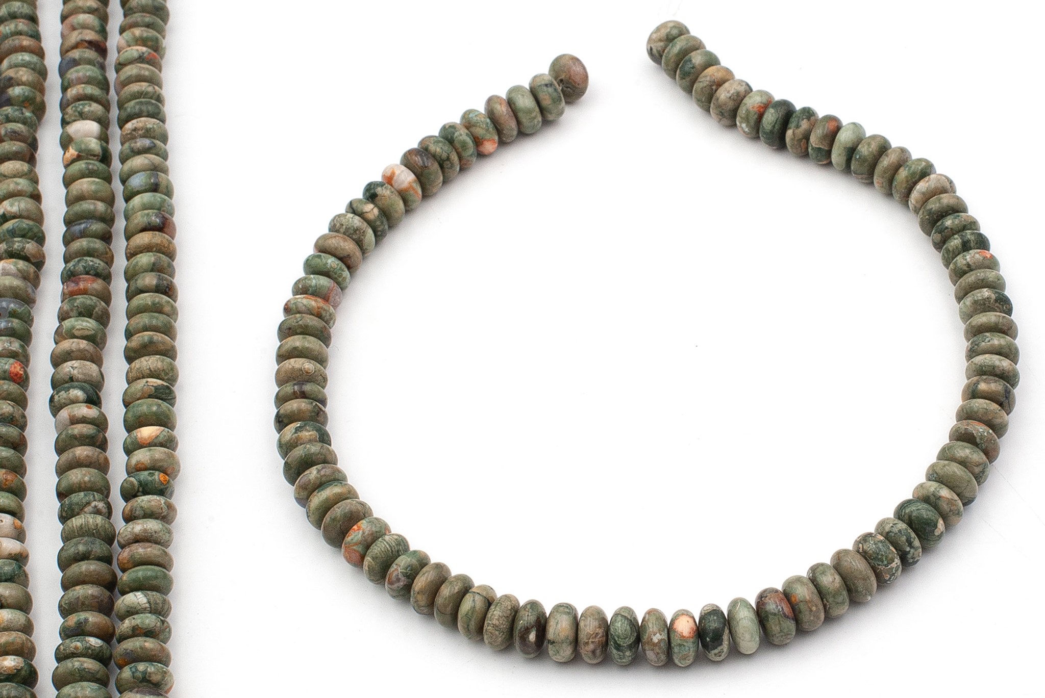 Rhyolit Button 10x5mm Strang