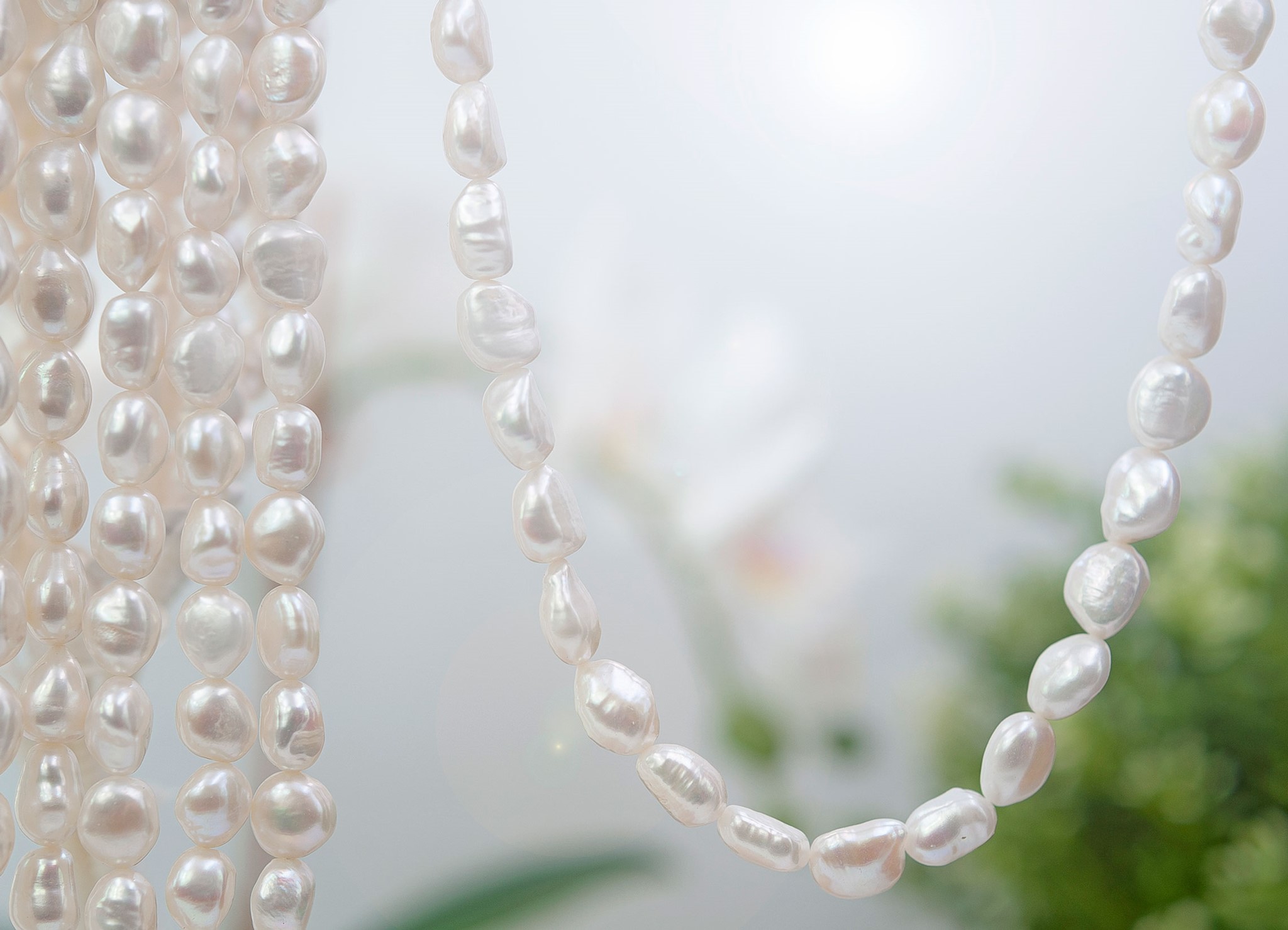 Bild von Süsswasser Perlen Barock 10-11mm Strang (weiss) 