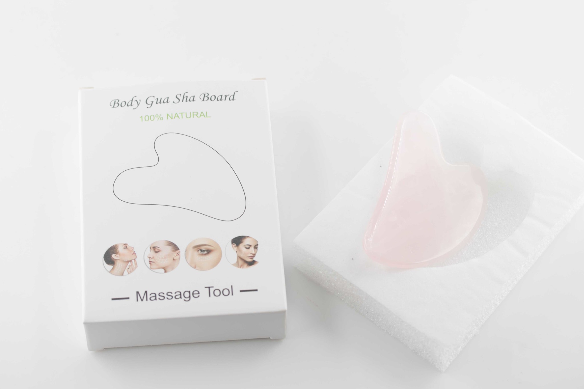 Bild von Rosenquarz Guasha Massage Form 8x5cm, mit Box