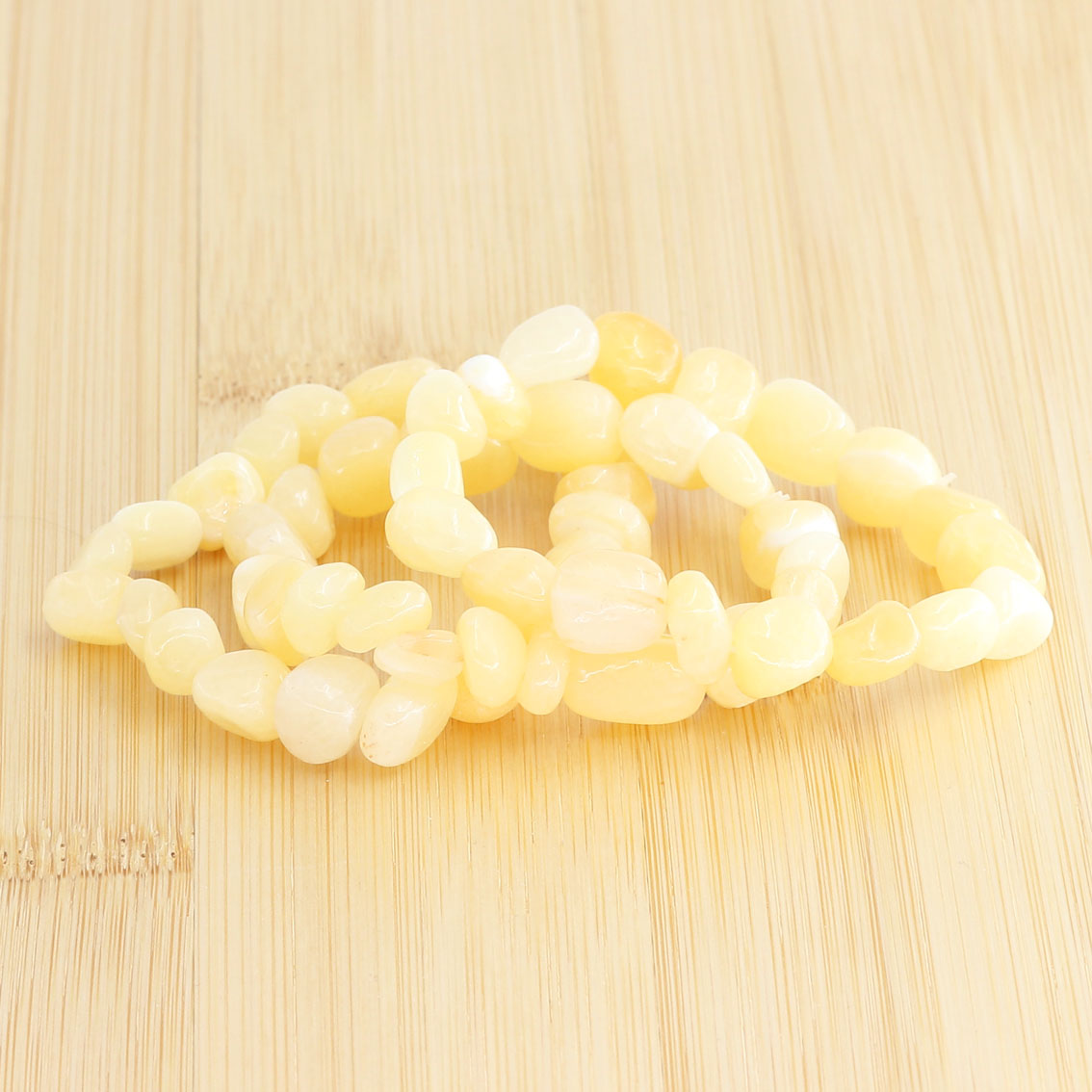 Immagine di Gelber Calcit Nuggets Crazy  8-12mm Armband