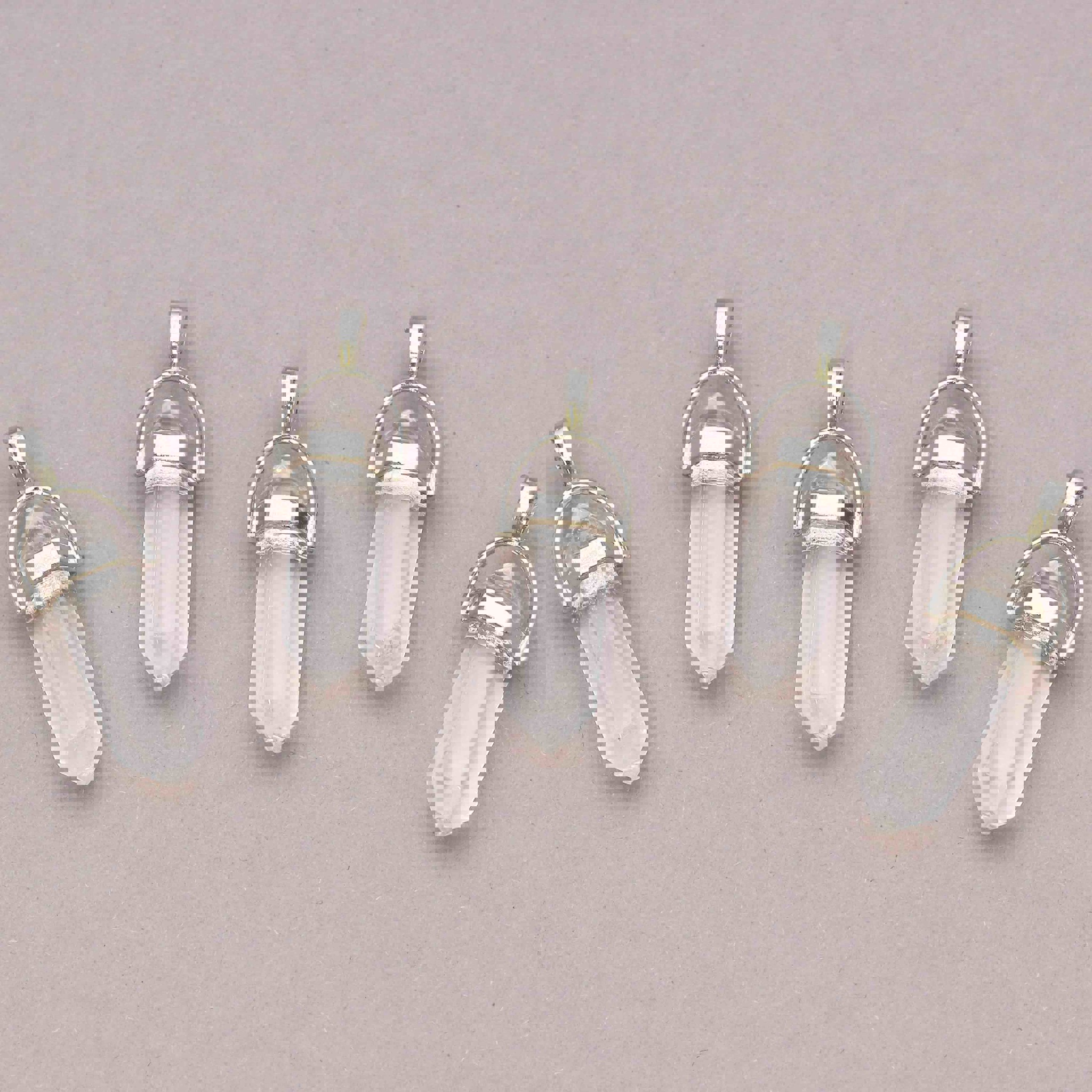 Bild von Bergkristall Doppelender Spitze 30x10mm Anhänger mit Metallöse