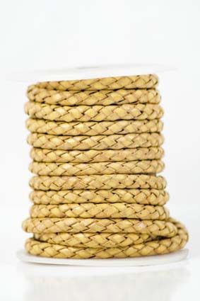 Immagine di Lederband geflochten 4mm gold antik, auf 5m-Rolle