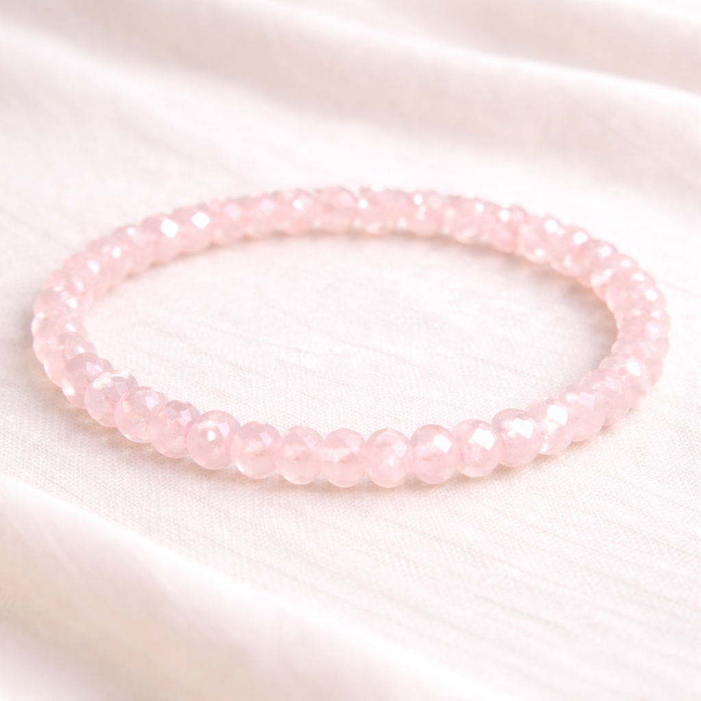 Bild von Rosenquarz fac. Button  6mm Armband