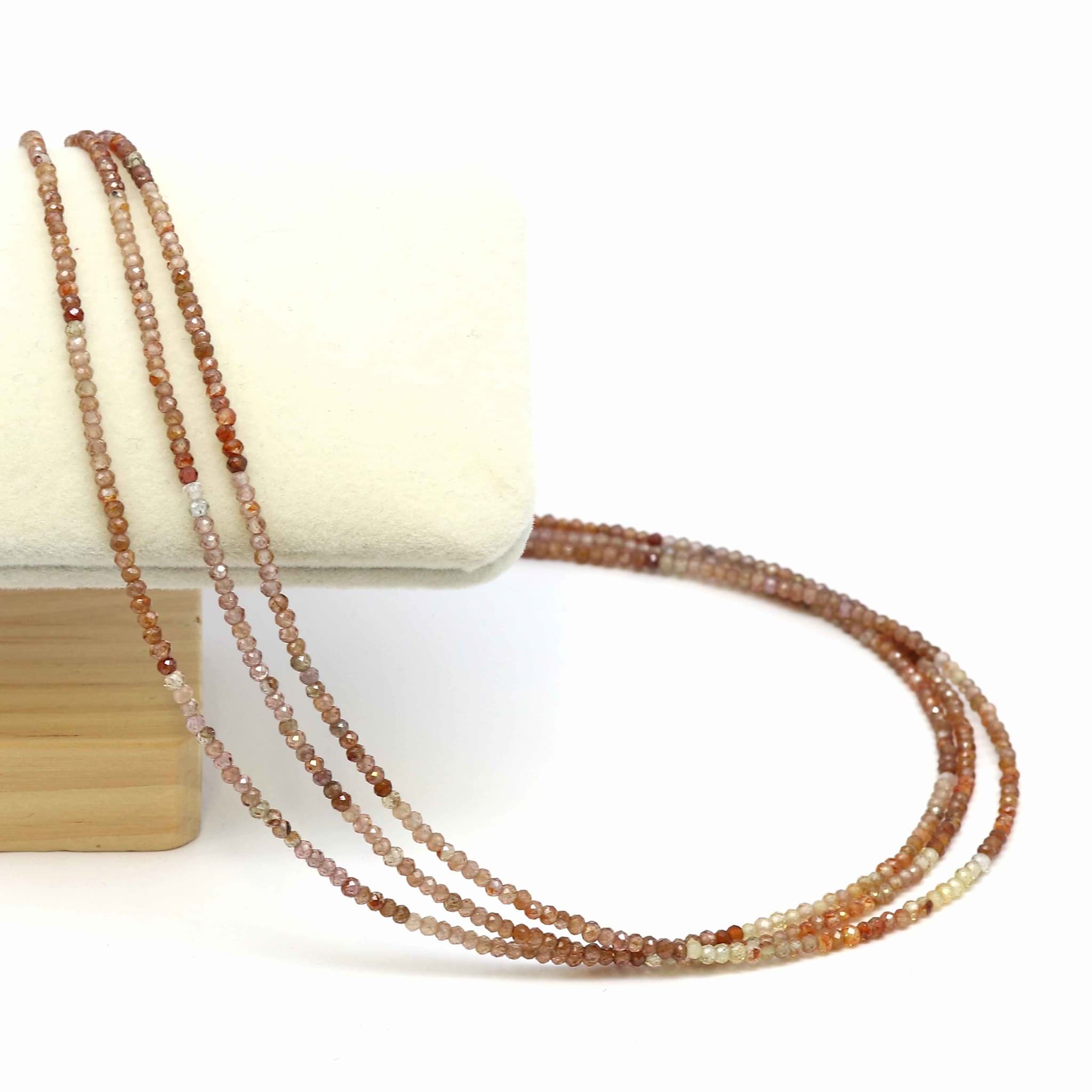 Zirkon fac. Kugeln  2.5mm Halskette mit Silberverschluss (orange/lila)