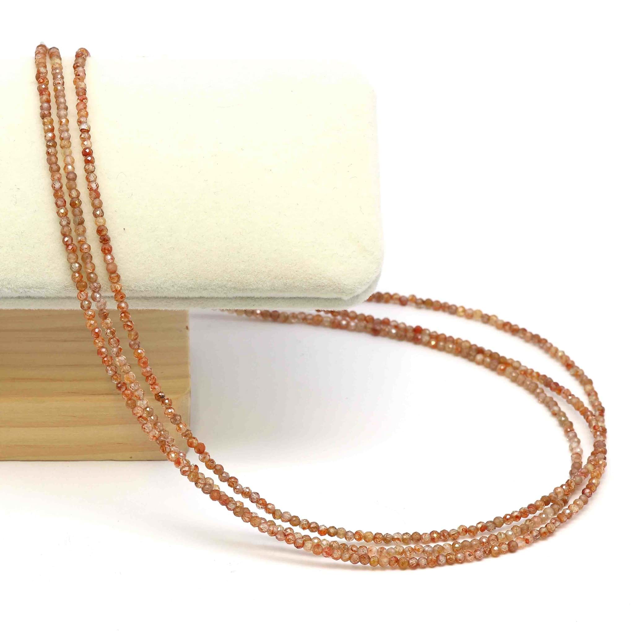 Zirkon fac. Kugeln  2.5mm Halskette mit Silberverschluss (orange)