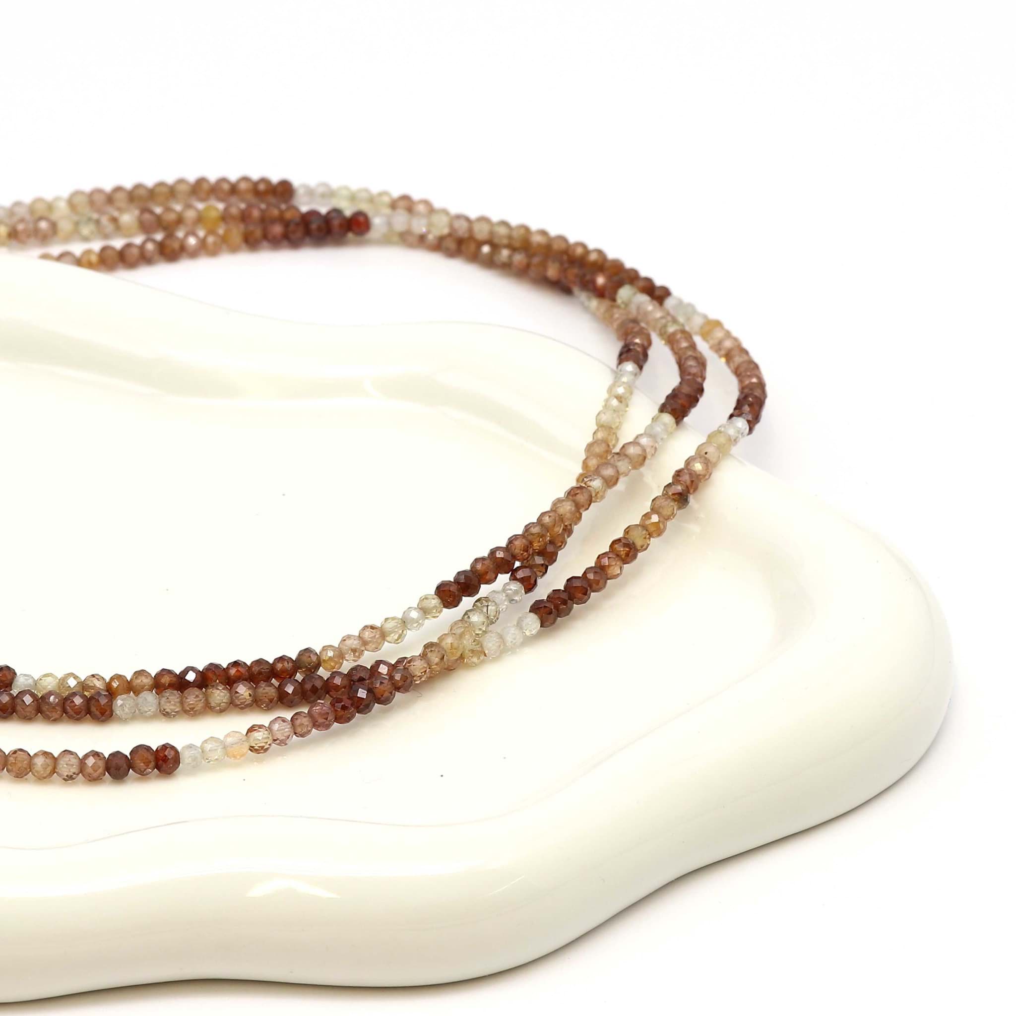 Zirkon fac. Kugeln  3mm Halskette mit Silberverschluss (braun/gelb)