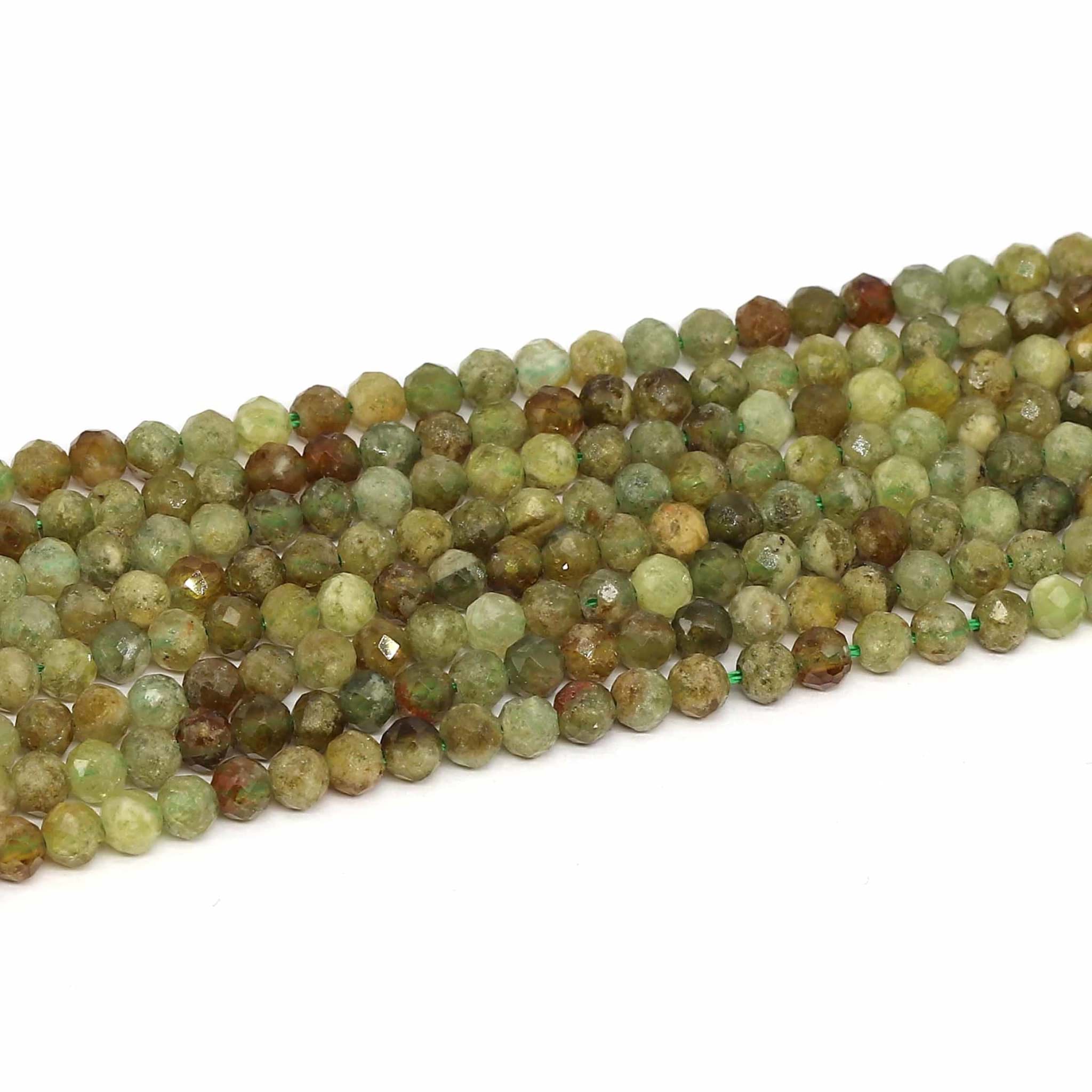 Grüner Granat fac. Kugeln  3.5mm Strang