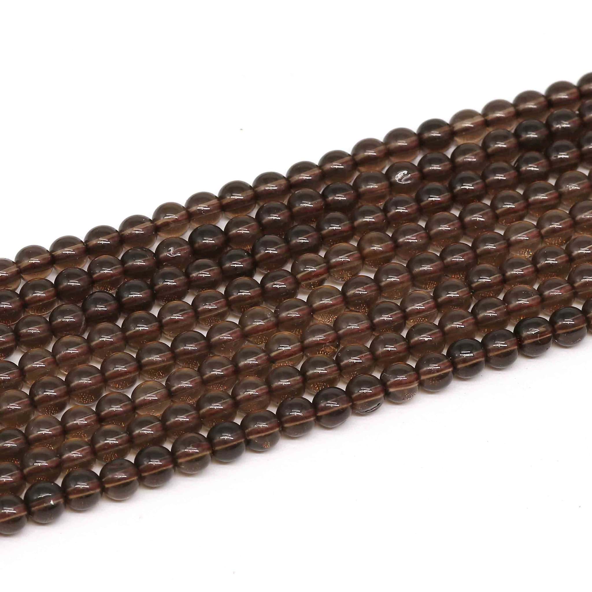 Rauchquarz Kugeln  4mm Strang