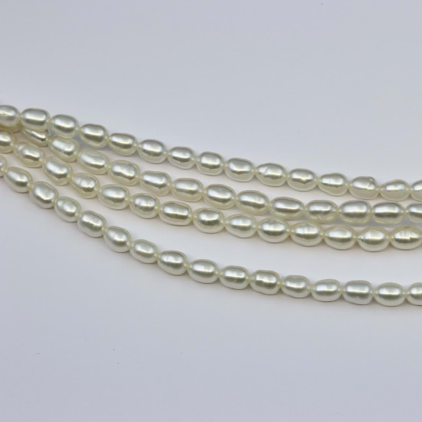Perles d'eau douce grain de riz 6x5mm fil de perles
