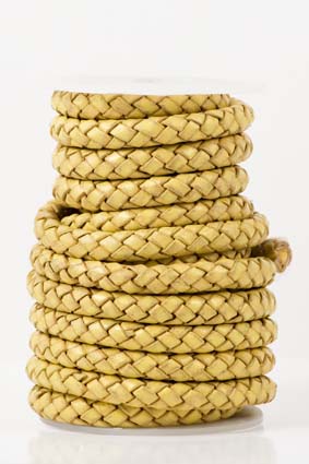 Immagine di Lederband geflochten 8mm gold antik, auf 5m-Rolle