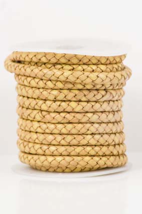 Immagine di Lederband geflochten 6mm gold antik, auf 5m-Rolle