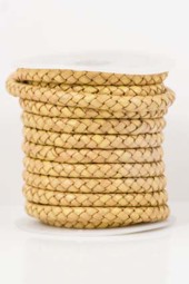 Bild von Lederband geflochten 6mm gold antik, auf 5m-Rolle