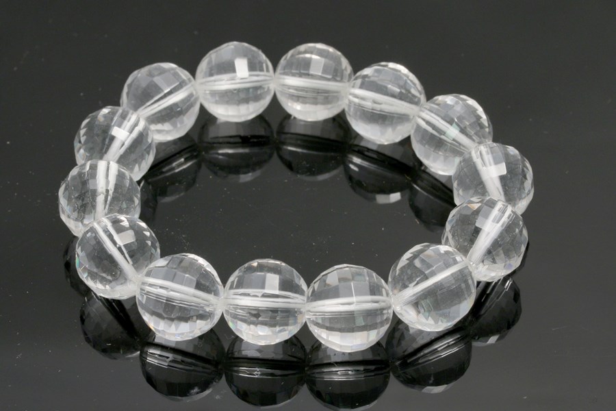 Bild von Bergkristall facettierte Kugeln 14mm Armband