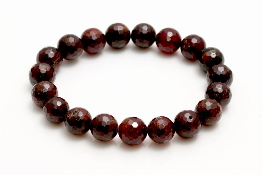 Bild von Hessonit facettierte Kugeln 10mm Armband