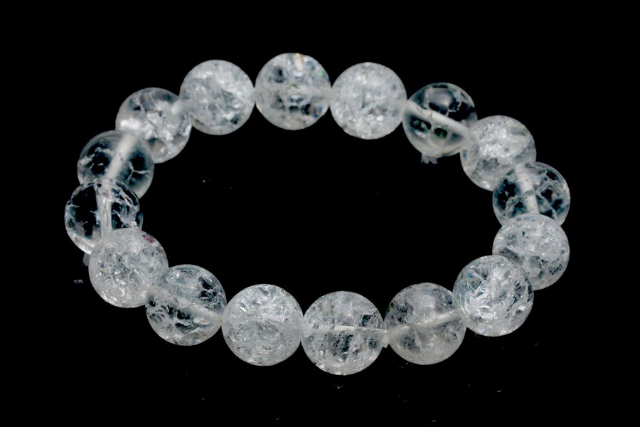 Bild von Iris Bergkristall Kugeln 12mm Armband